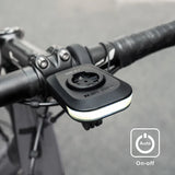 Eclairage avant RAVEMEN FR 300 avec fixation support compteur Garmin/Wahoo
